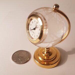 crystal globe clock